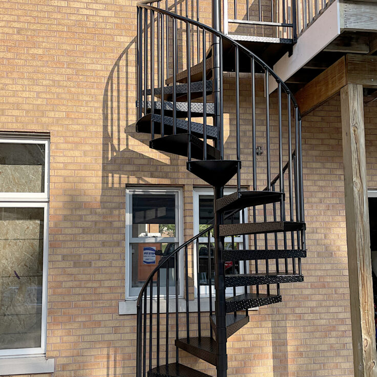 Custom spiral wrought iron staircase in Oak Park