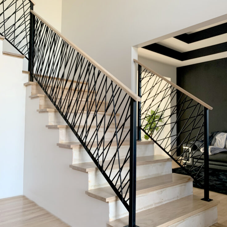 Custom wrought iron & wood railings art deco painted satin black bottom staircase alt view