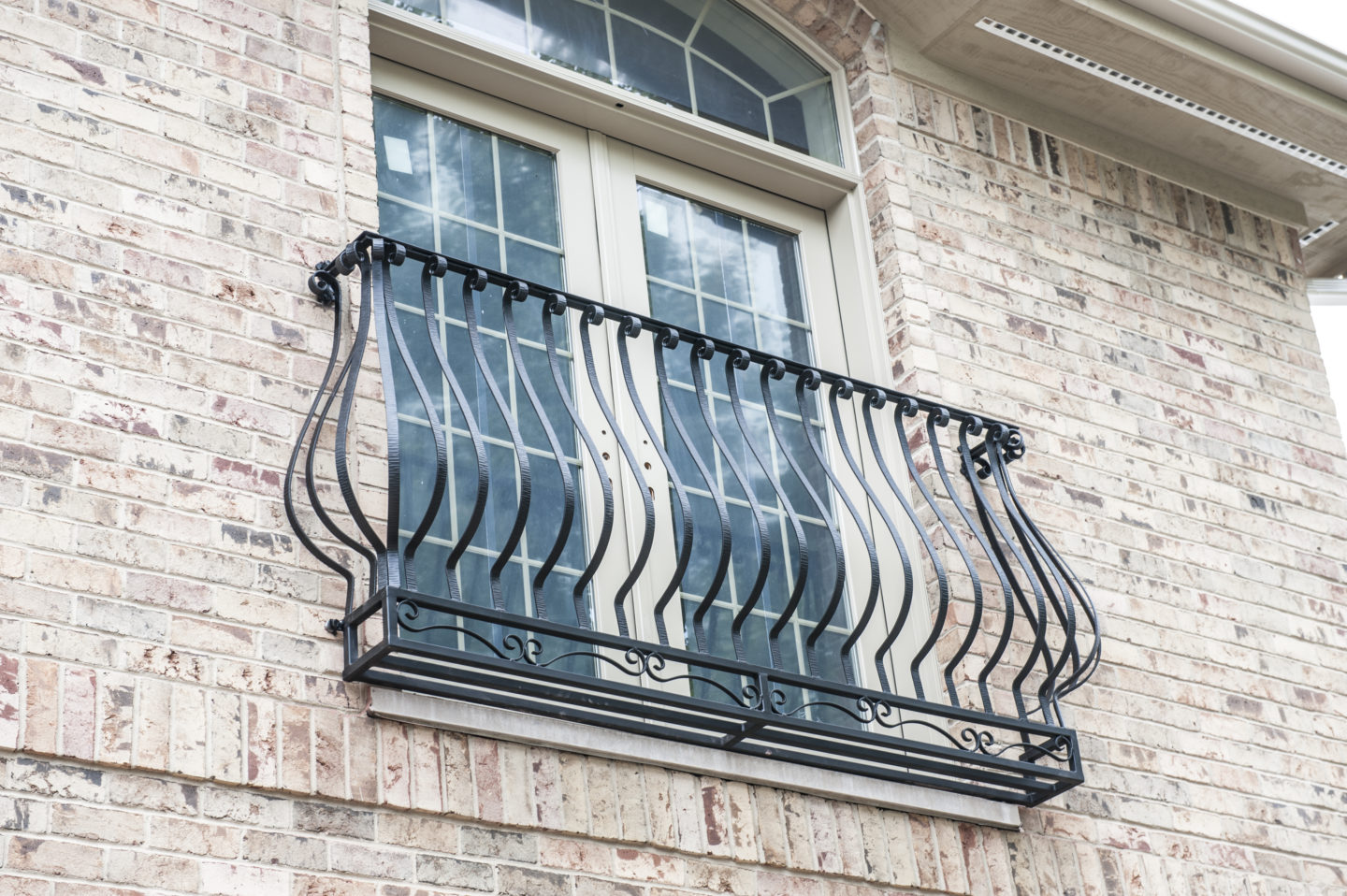 Custom french country wrought iron barrel balcony painted satin black for a client in Kennilworth